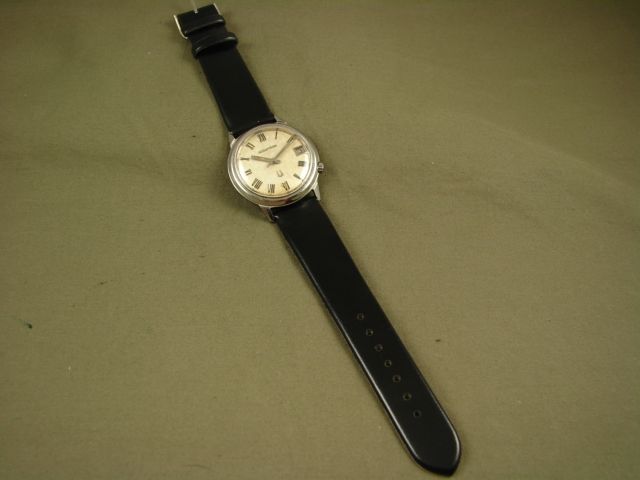   ACCUTRON BULOVA QUARTZ DRESS WATCH ROMAN NMRL DATE STEEL 1967  