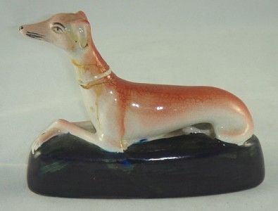 LATE 19TH CENT STAFFORDSHIRE POTTERY GREYHOUND  