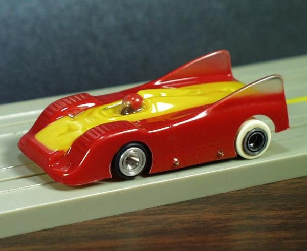 RIGGEN H.O. #126   RED & YELLOW PORSCHE 917   perhaps a demo  